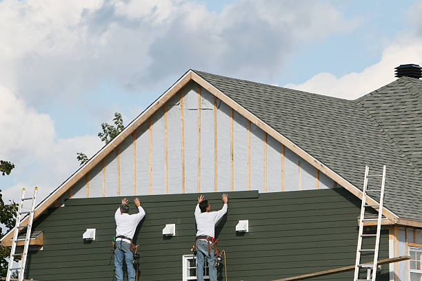 Professional Siding Replacement technician working in Port Republic, NJ